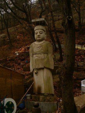 White statute in Korea.. solitary.. meditative..